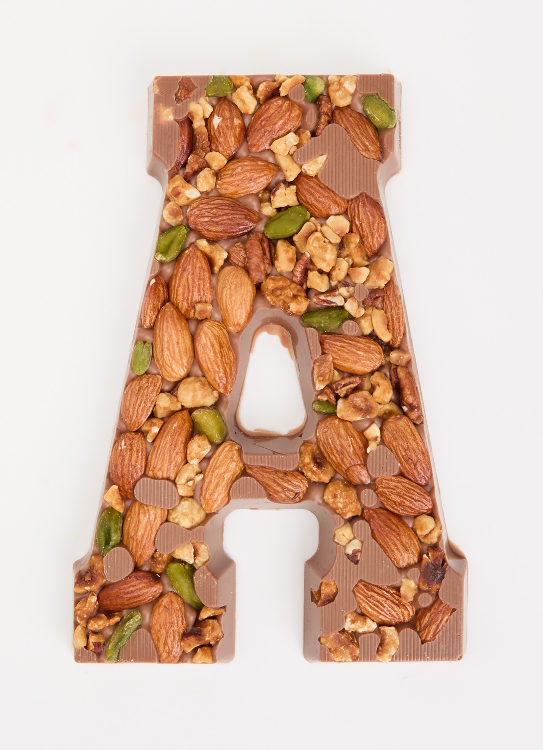 Urban Cacao Melk chocoladeletter met noten 180 gram - voorkant 3 a