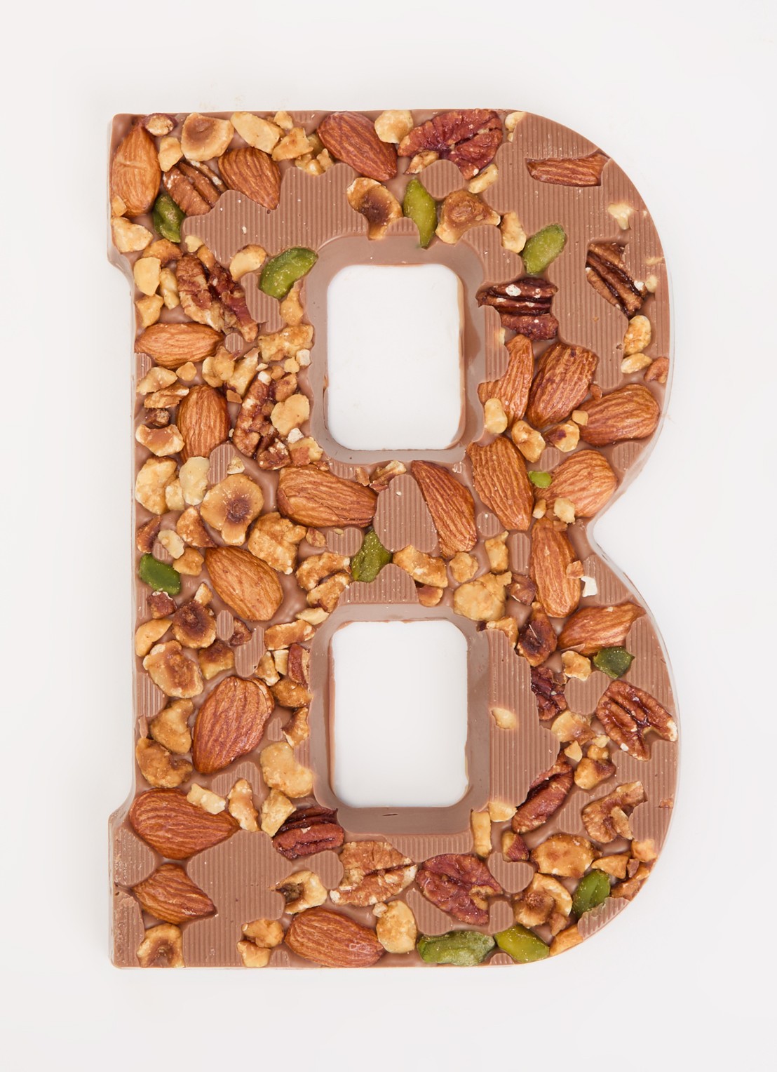 Urban Cacao Melk chocoladeletter met noten 180 gram - voorkant 2 b