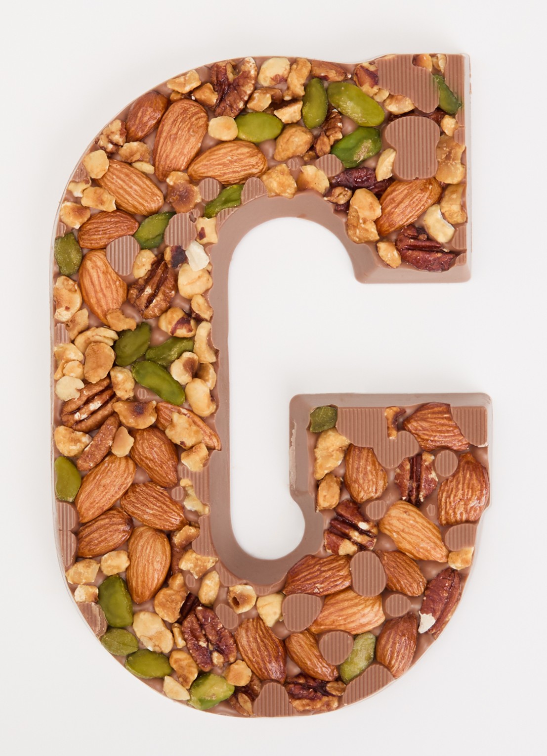 Urban Cacao Melk chocoladeletter met noten 180 gram - voorkant 2 g