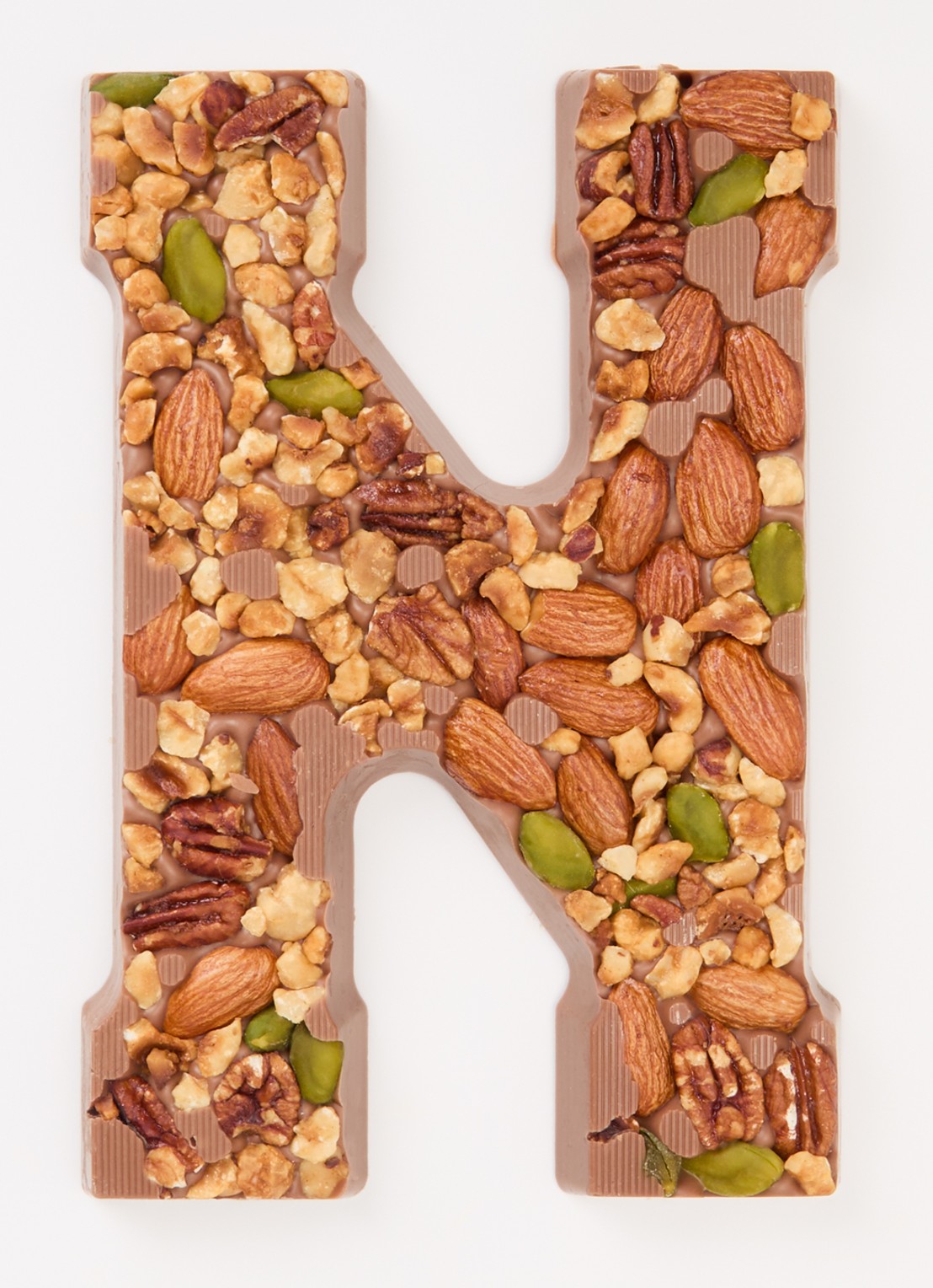 Urban Cacao Melk chocoladeletter met noten 180 gram - voorkant 2 n