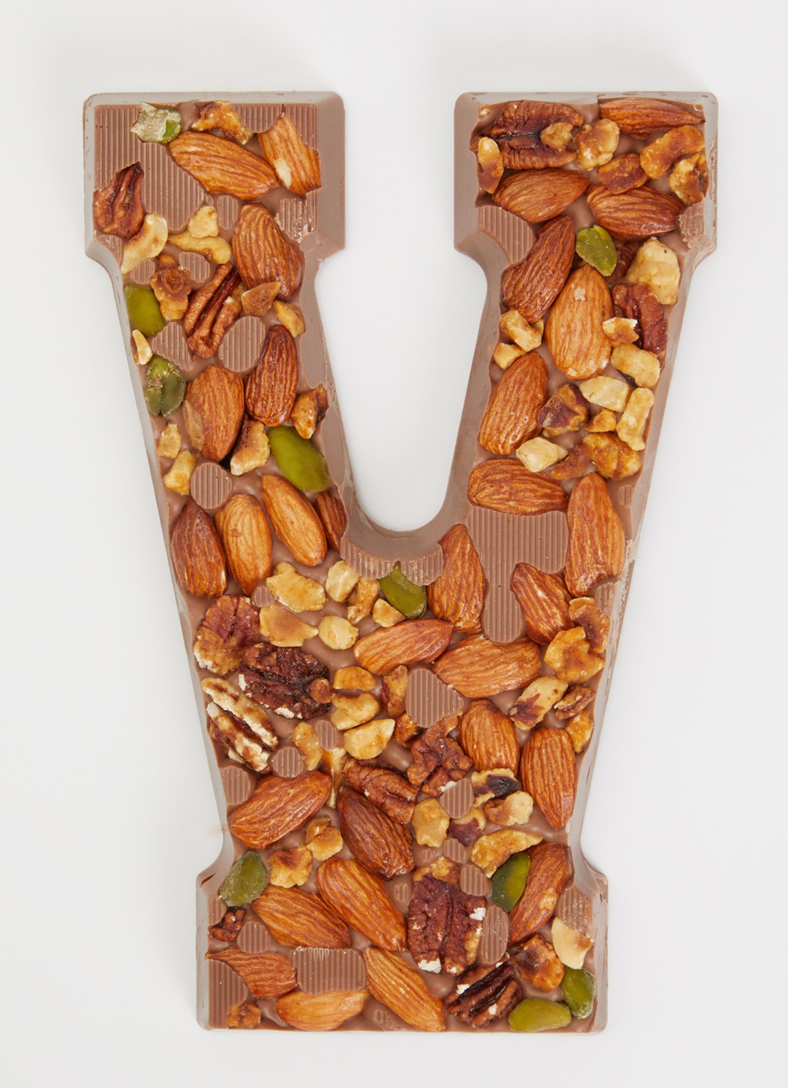 Urban Cacao Melk chocoladeletter met noten 180 gram - voorkant 2 v