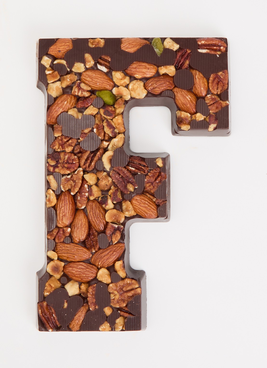 Urban Cacao Pure chocoladeletter met noten 180 gram - voorkant 2 f
