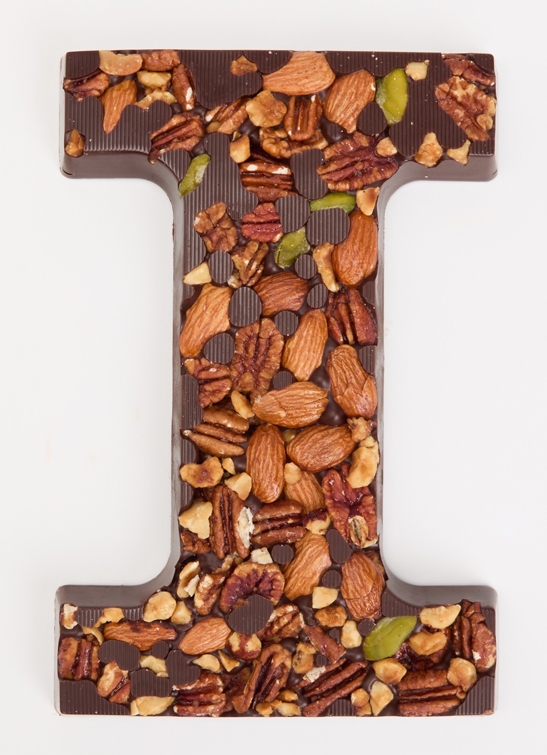Urban Cacao Pure chocoladeletter met noten 180 gram - voorkant 2 i