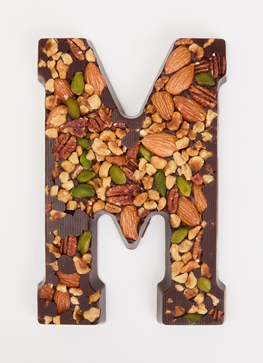 Urban Cacao Pure chocoladeletter met noten 180 gram - voorkant 2 m