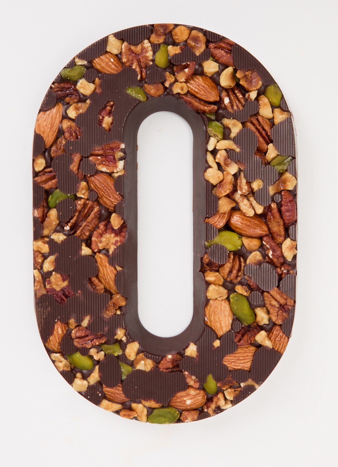 Urban Cacao Pure chocoladeletter met noten 180 gram - voorkant 2 o