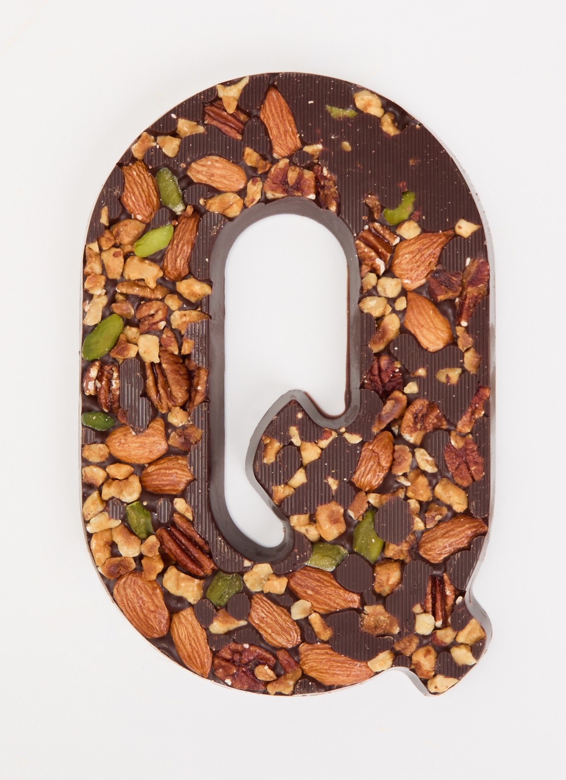 Urban Cacao Pure chocoladeletter met noten 180 gram - voorkant 2 q