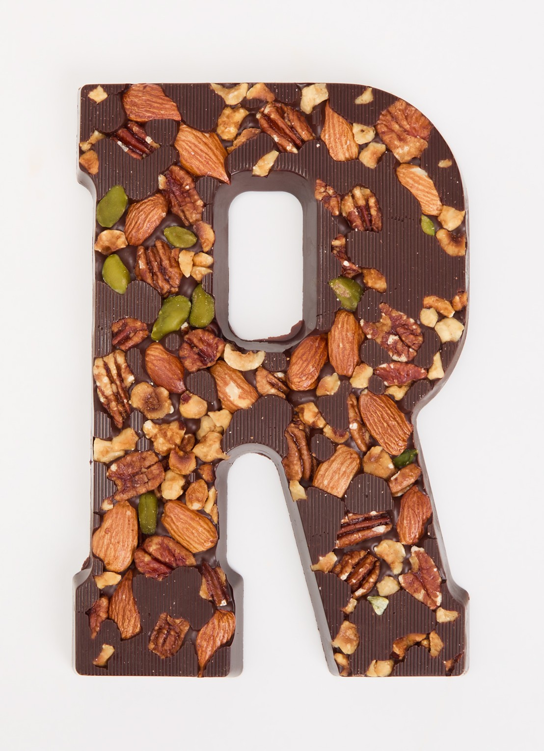 Urban Cacao Pure chocoladeletter met noten 180 gram - voorkant 2 r