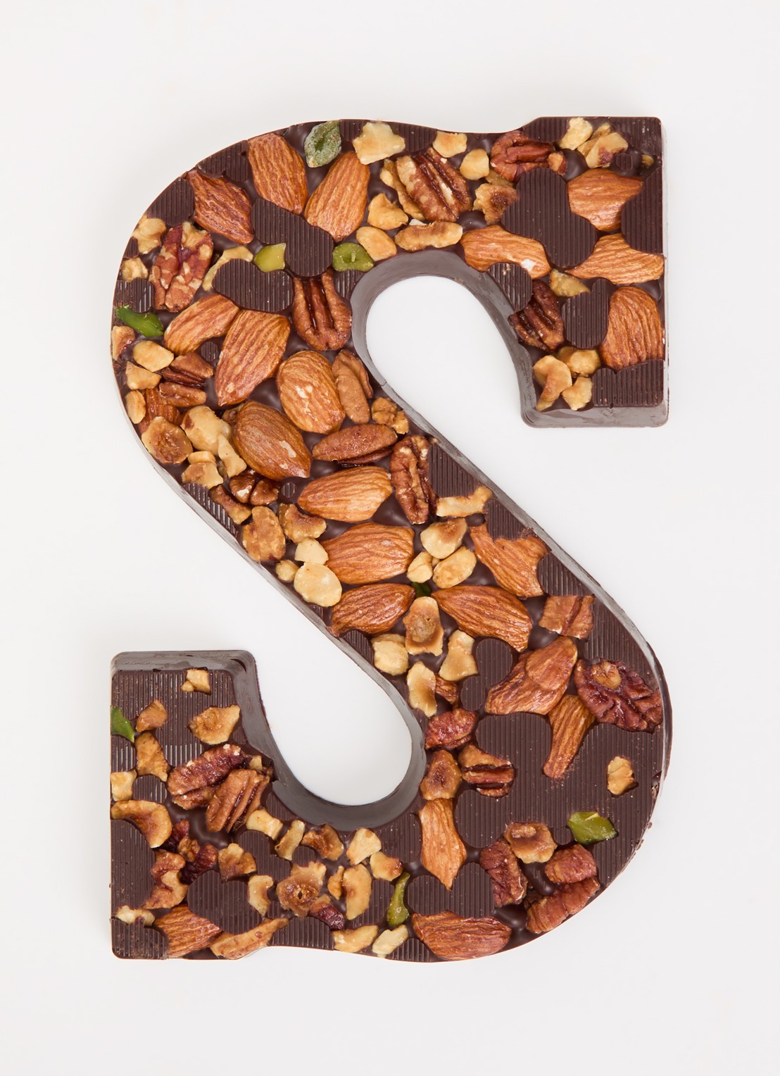 Urban Cacao Pure chocoladeletter met noten 180 gram - voorkant 2 s
