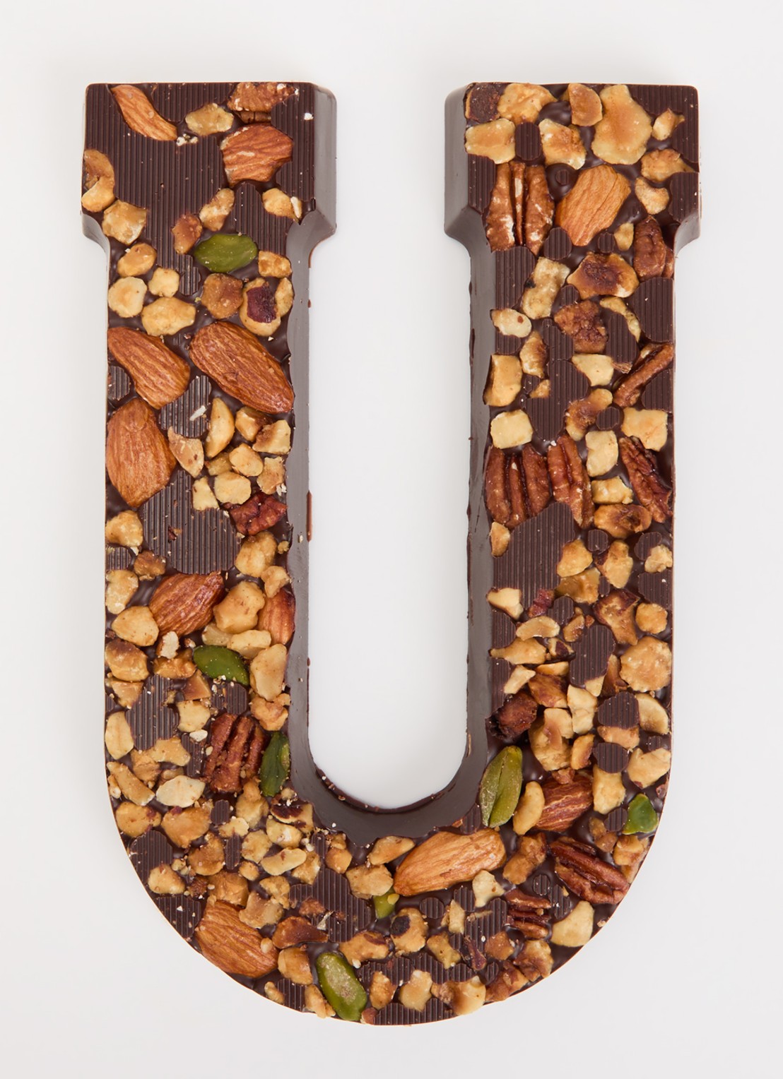 Urban Cacao Pure chocoladeletter met noten 180 gram - voorkant 2 u