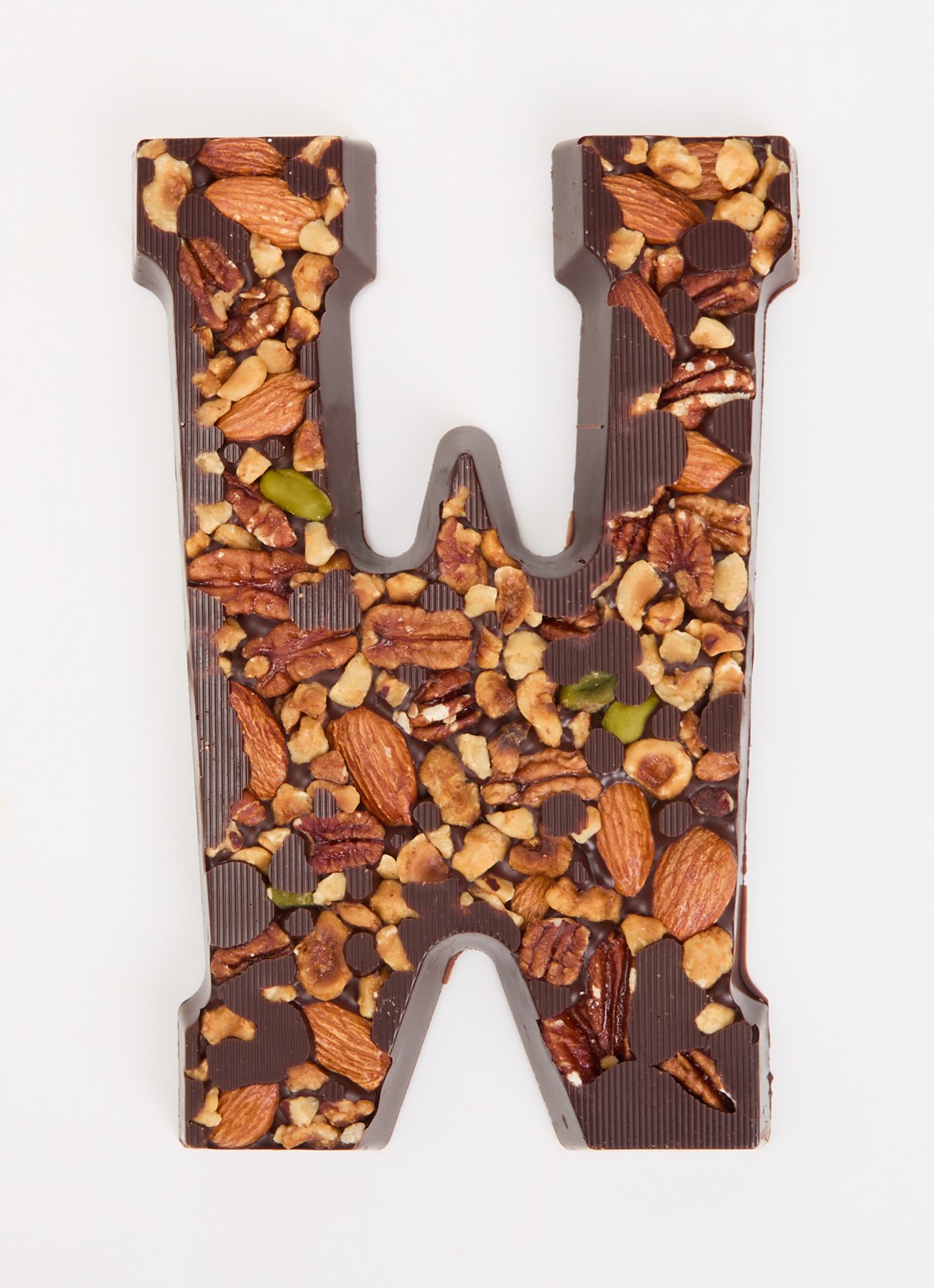 Urban Cacao Pure chocoladeletter met noten 180 gram - voorkant 2 w