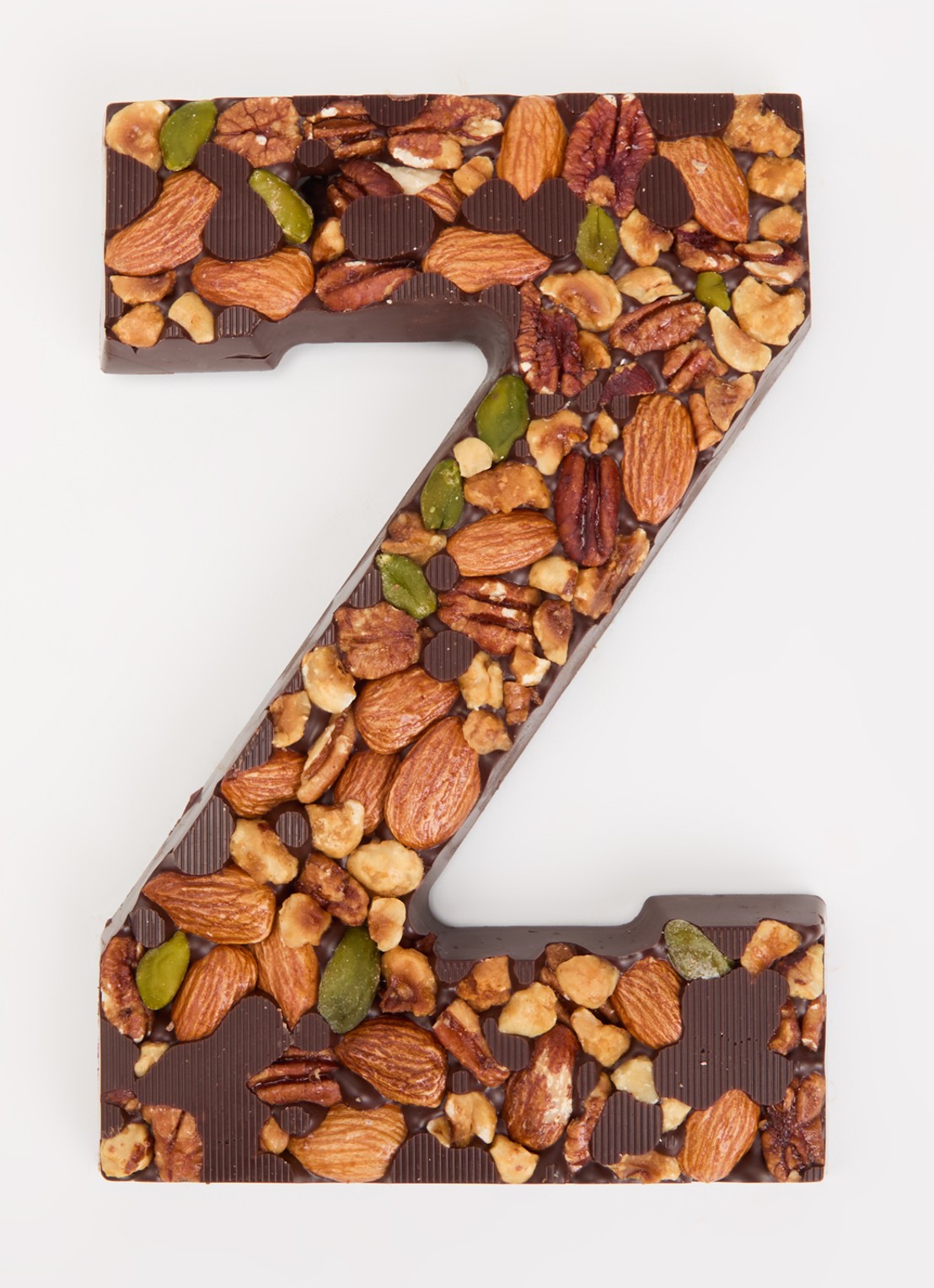 Urban Cacao Pure chocoladeletter met noten 180 gram - voorkant 2 z