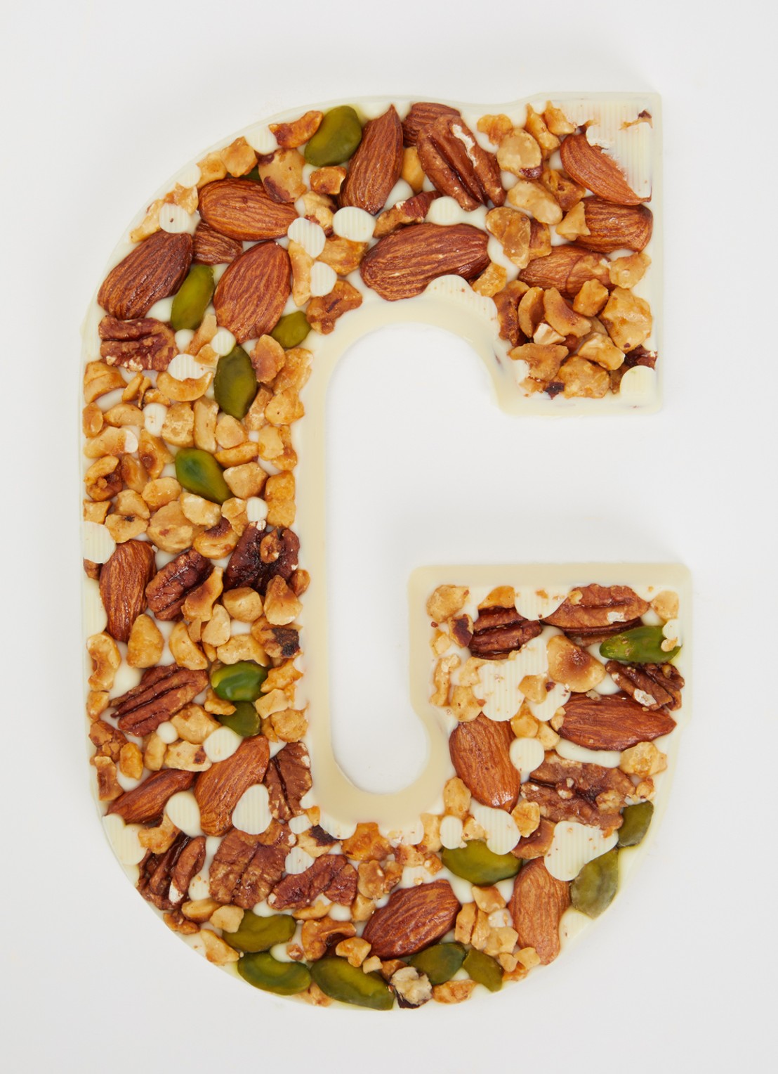 Urban Cacao Witte chocoladeletter met noten 180 gram - voorkant 2 g