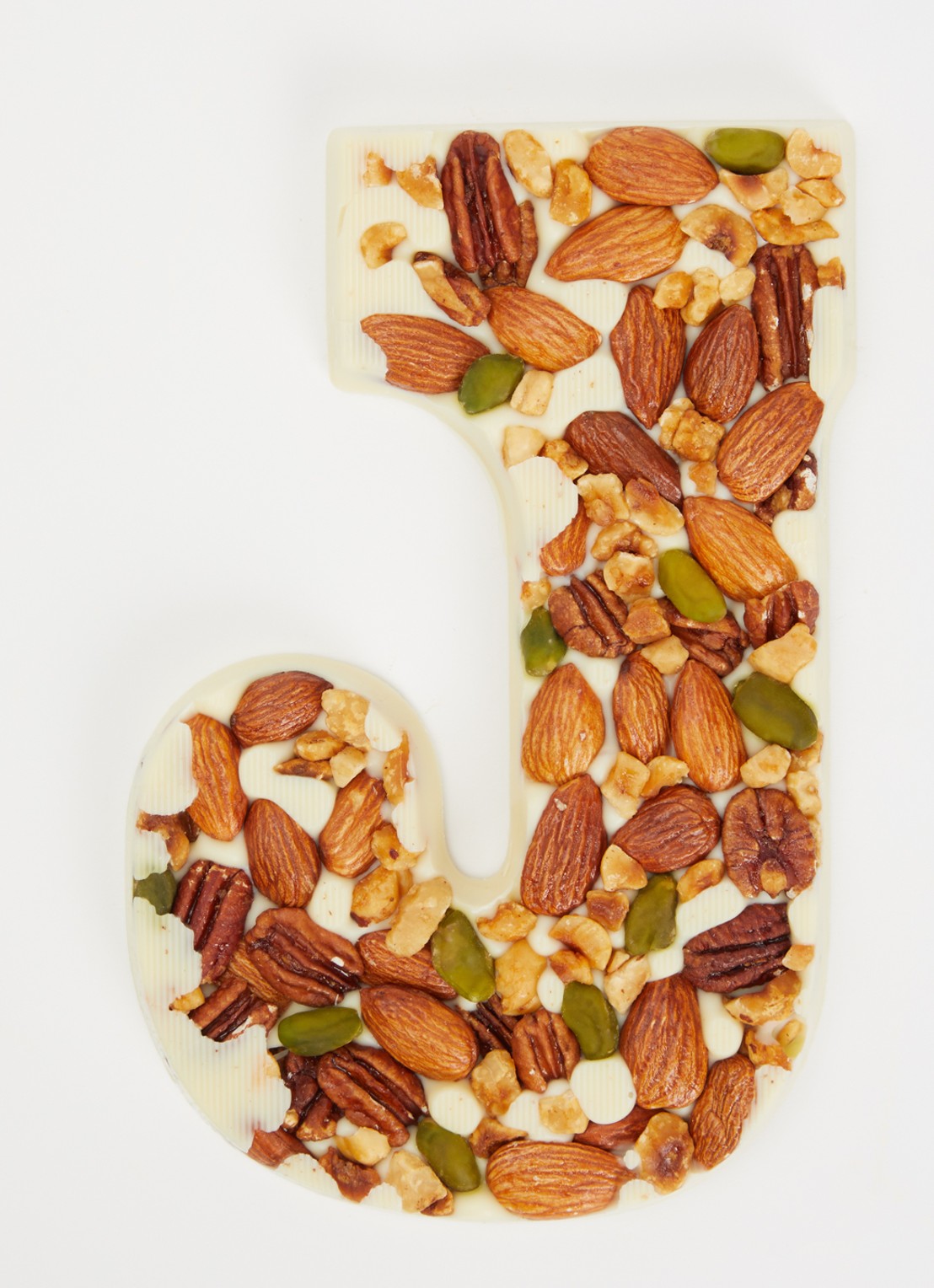Urban Cacao Witte chocoladeletter met noten 180 gram - voorkant 2 j