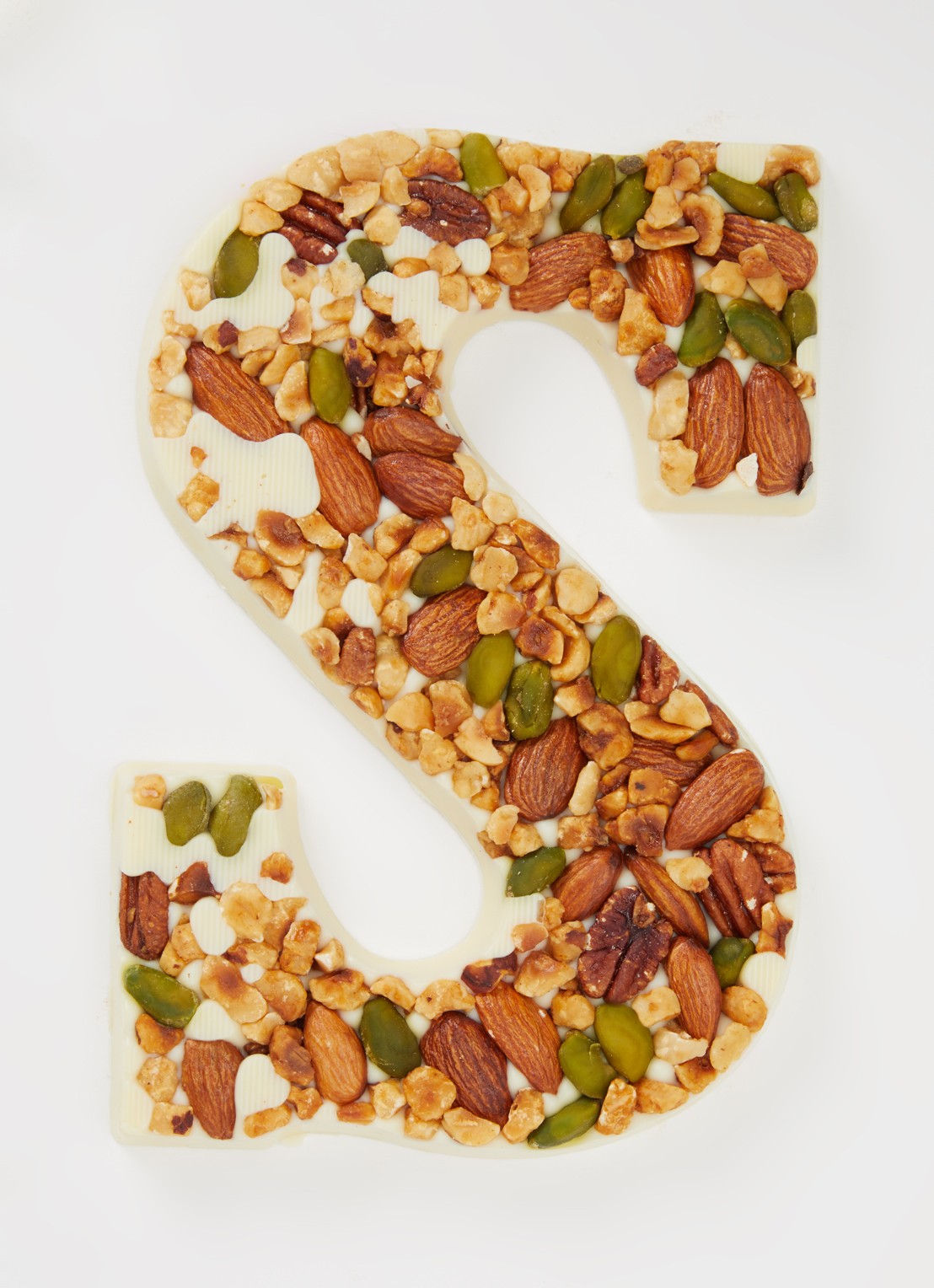 Urban Cacao Witte chocoladeletter met noten 180 gram - voorkant 2 s