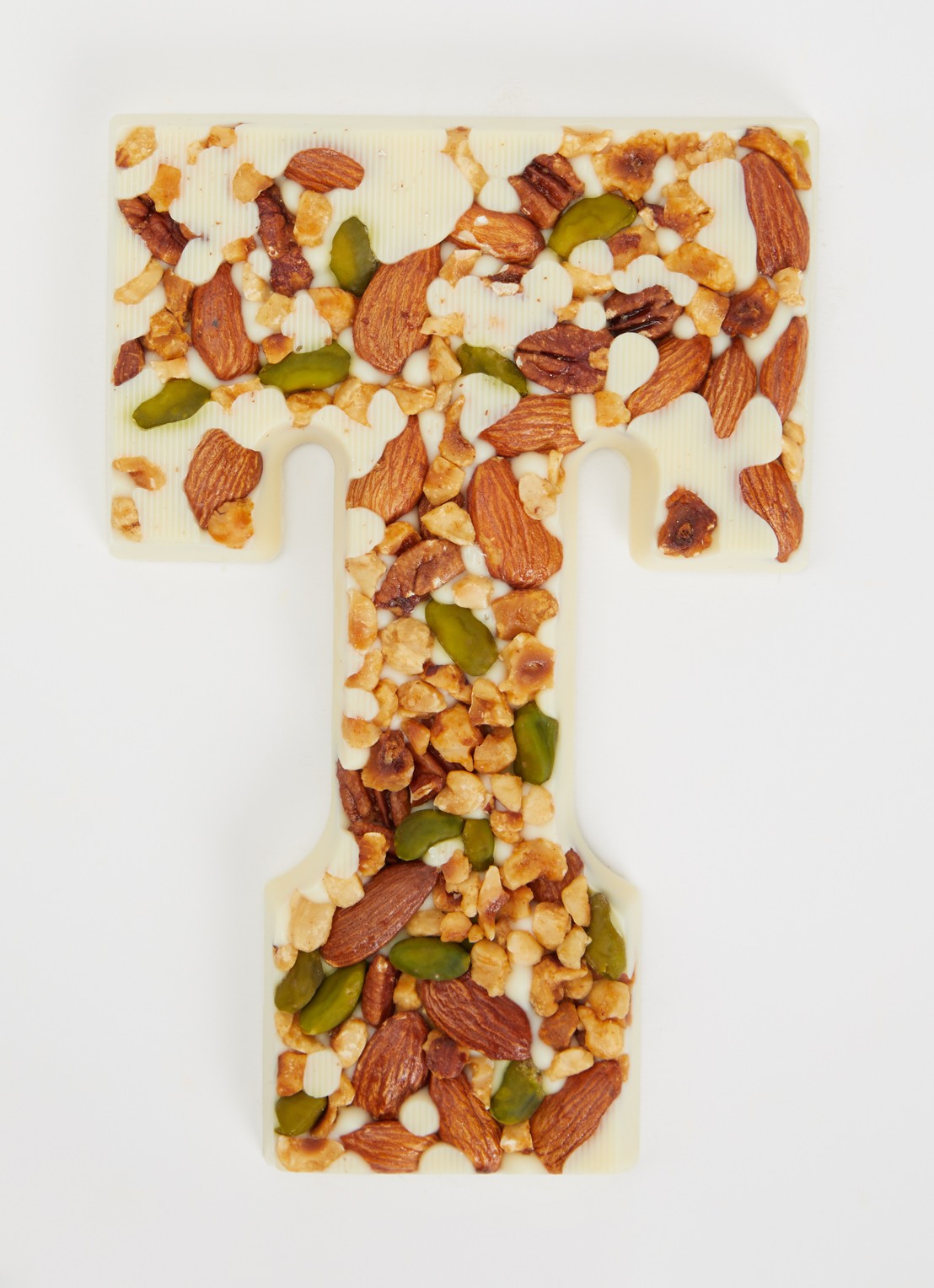 Urban Cacao Witte chocoladeletter met noten 180 gram - voorkant 2 t