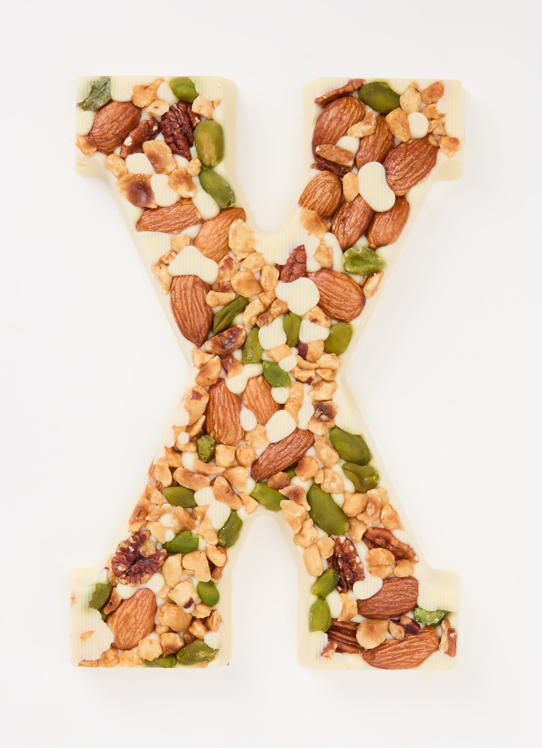 Urban Cacao Witte chocoladeletter met noten 180 gram - voorkant 2 x