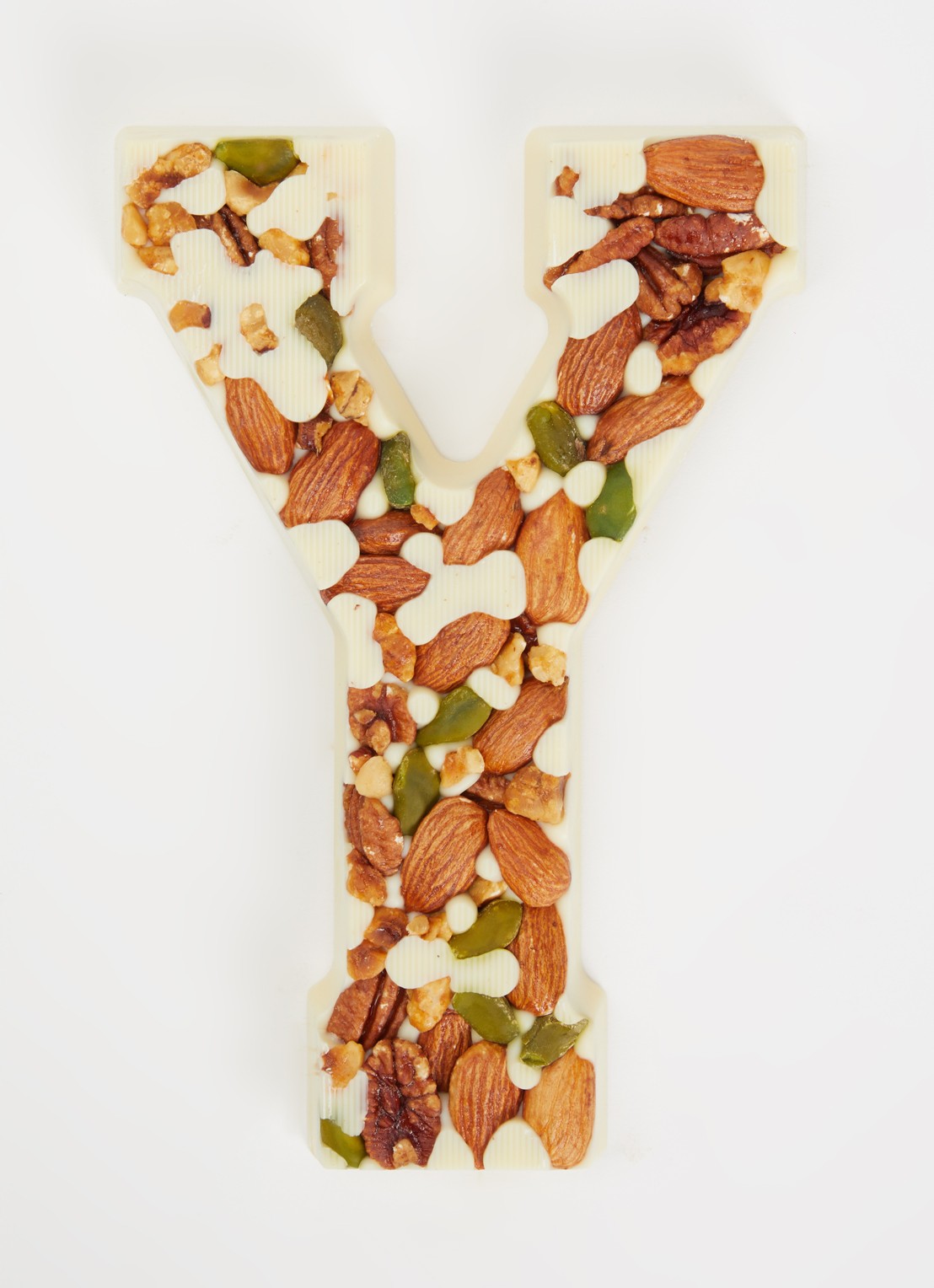 Urban Cacao Witte chocoladeletter met noten 180 gram - voorkant 2 y