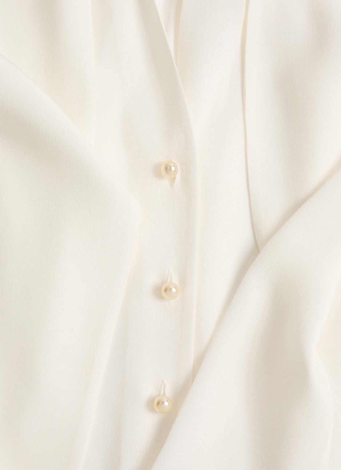 Valentino Garavani Blouse van zijde met strikkraag - detail gebroken wit