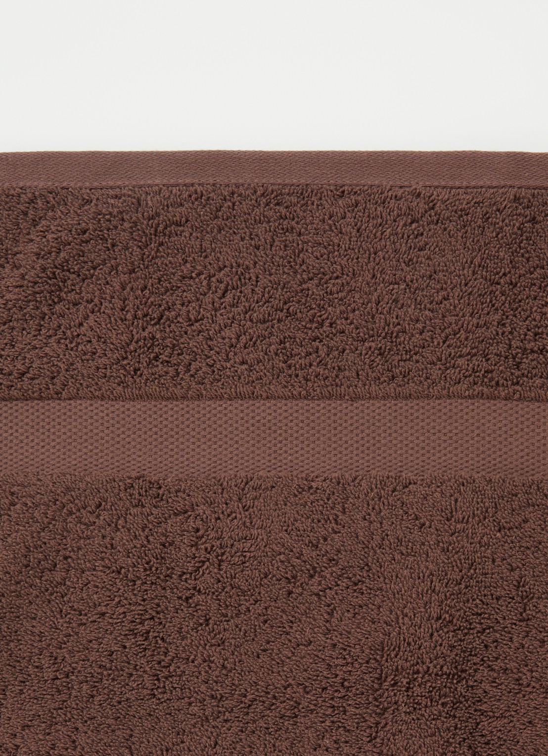 Vandyck Ranger badhanddoek - 650 gr/m2 - 68 x 127 cm - detail donkerbruin