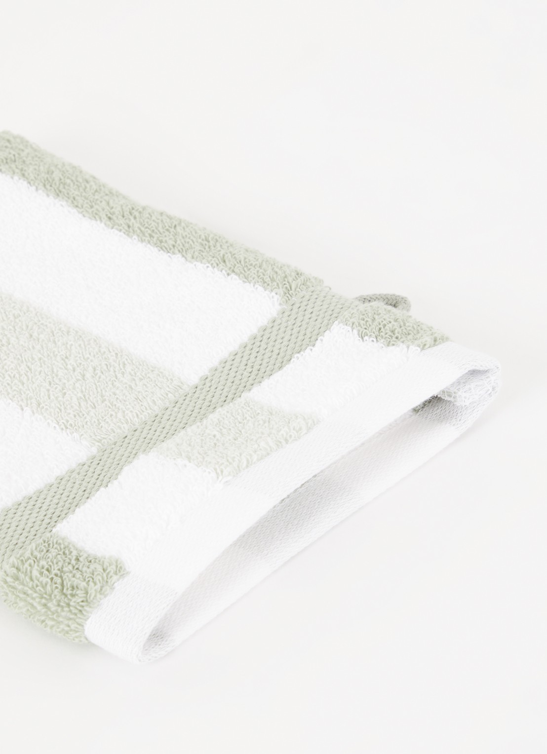 Vandyck Vancouver washand - 650 gr/m2 - 16 x 22 cm  - detail lindegroen