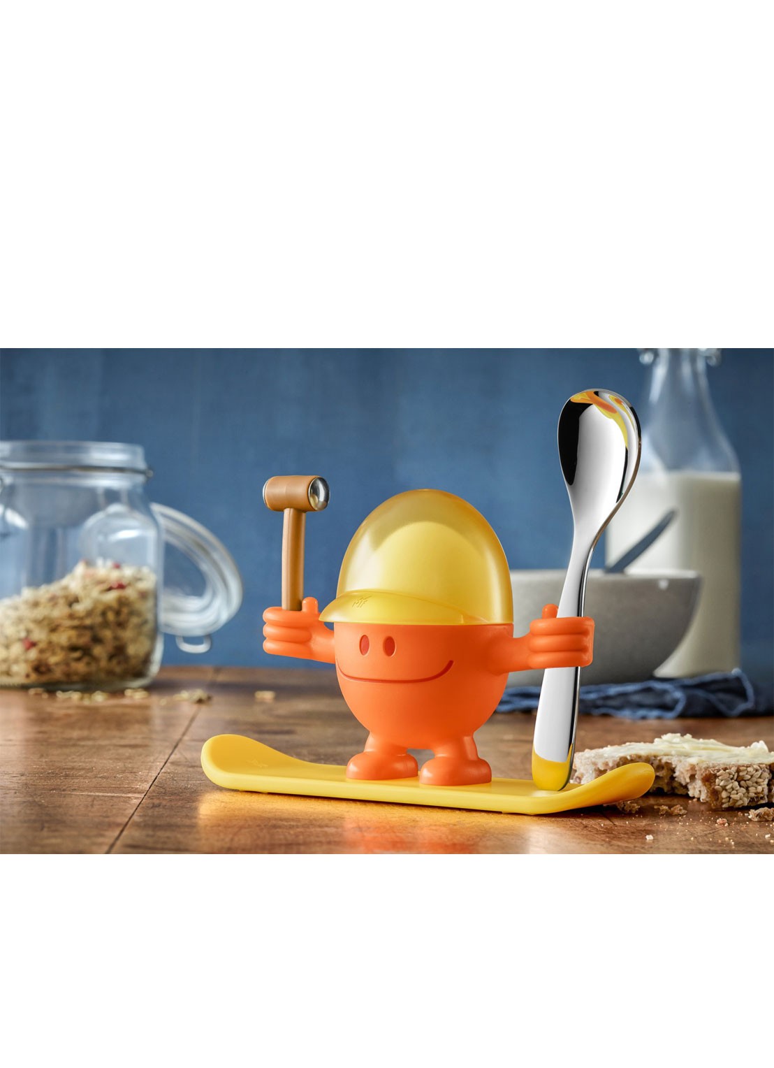 WMF McEgg eierdop met lepel 11 cm 2-delig - voorkant oranje