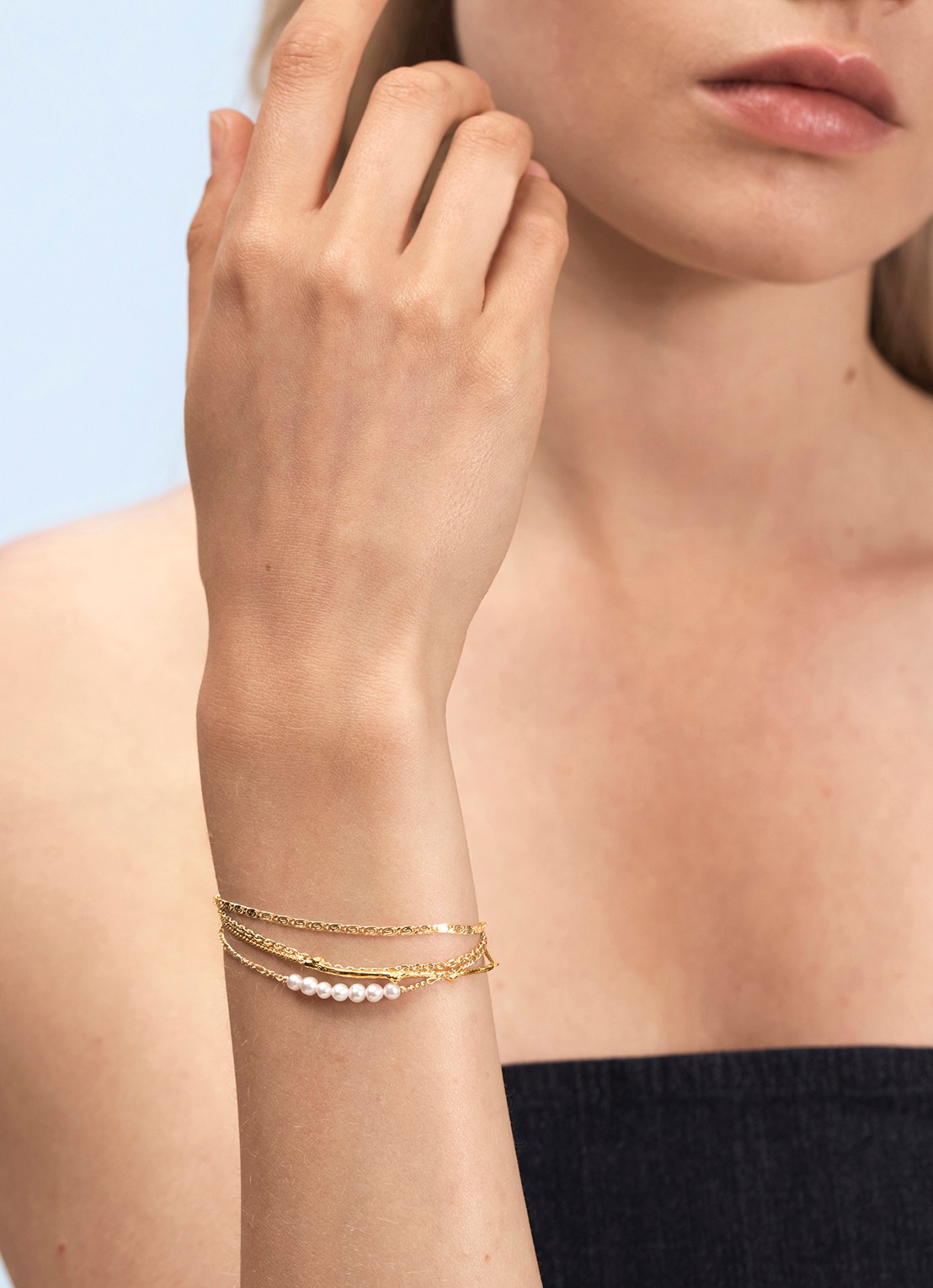 Wouters & Hendrix Armband van zilver - voorkant 2 goud