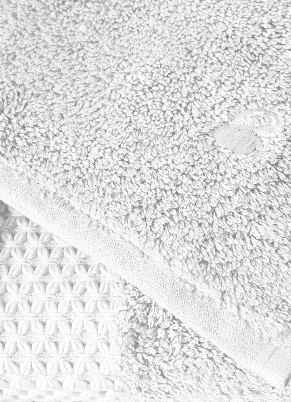 Yves Delorme Etoile badhanddoek - 700 gr/m2 - 55 x 100 cm - voorkant 2 lichtgrijs