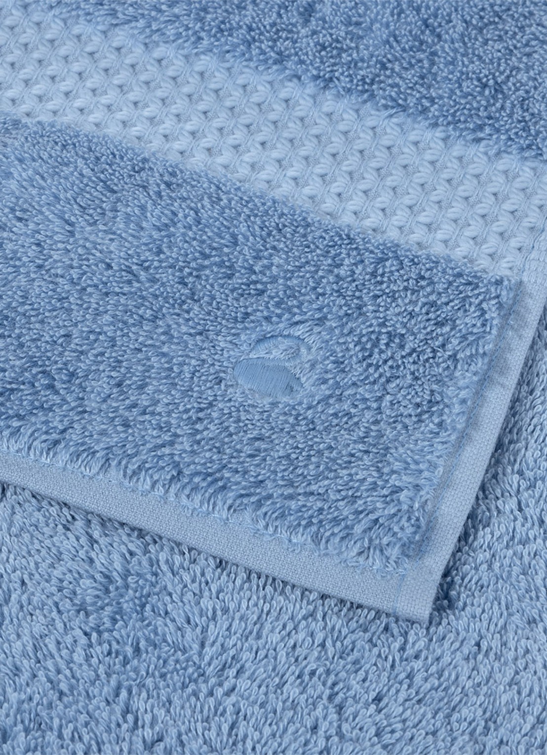 Yves Delorme Etoile badhanddoek - 700 gr/m2 - 55 x 100 cm - achterkant 3 blauw