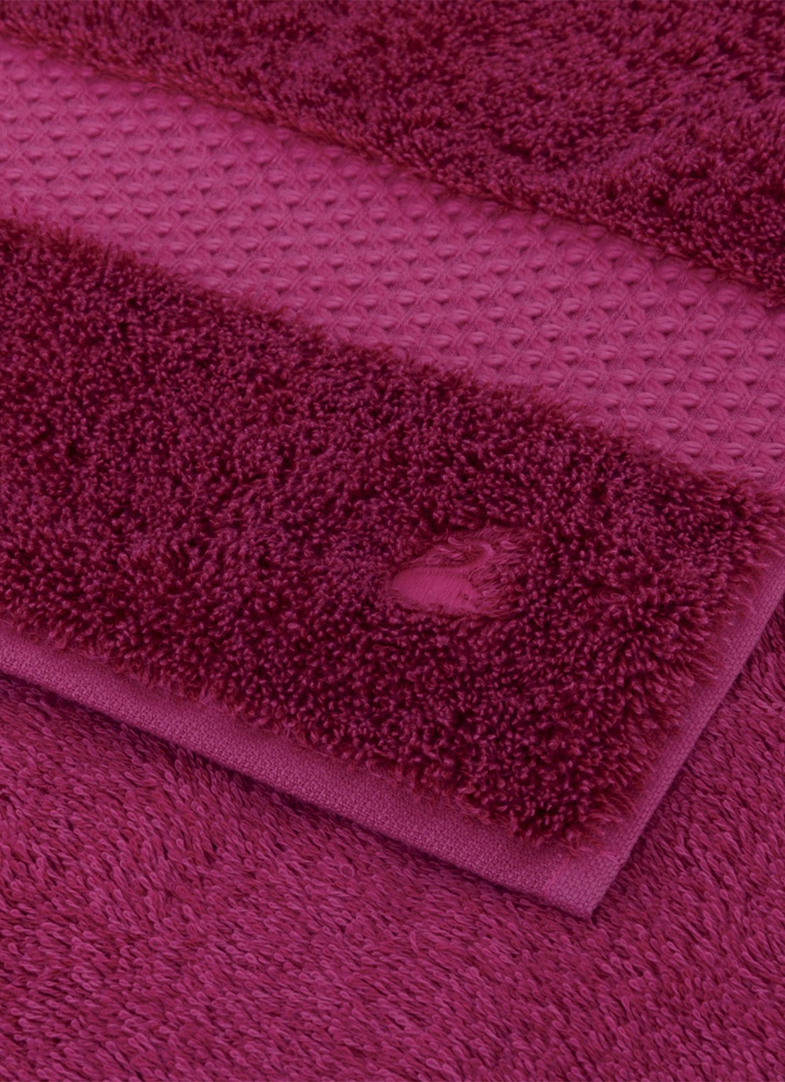 Yves Delorme Etoile badhanddoek - 700 gr/m2 - 55 x 100 cm - achterkant 3 fuchsia