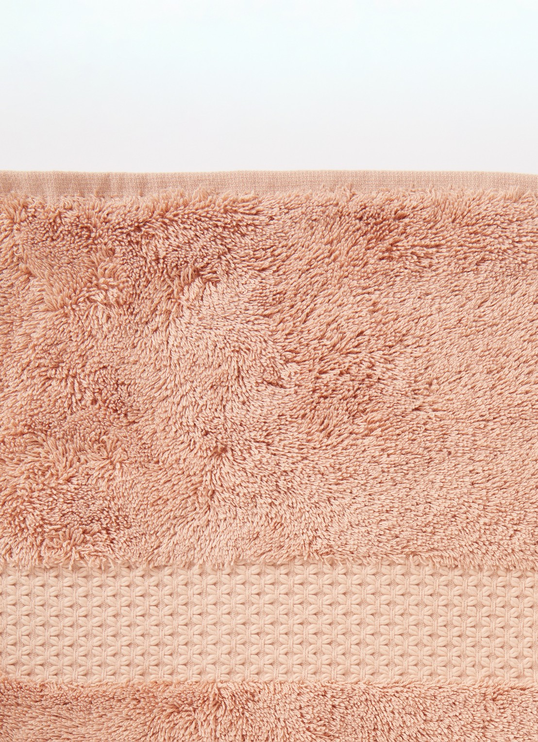 Yves Delorme Etoile badhanddoek - 700g/m2 - 70 x 140 cm - detail oranje