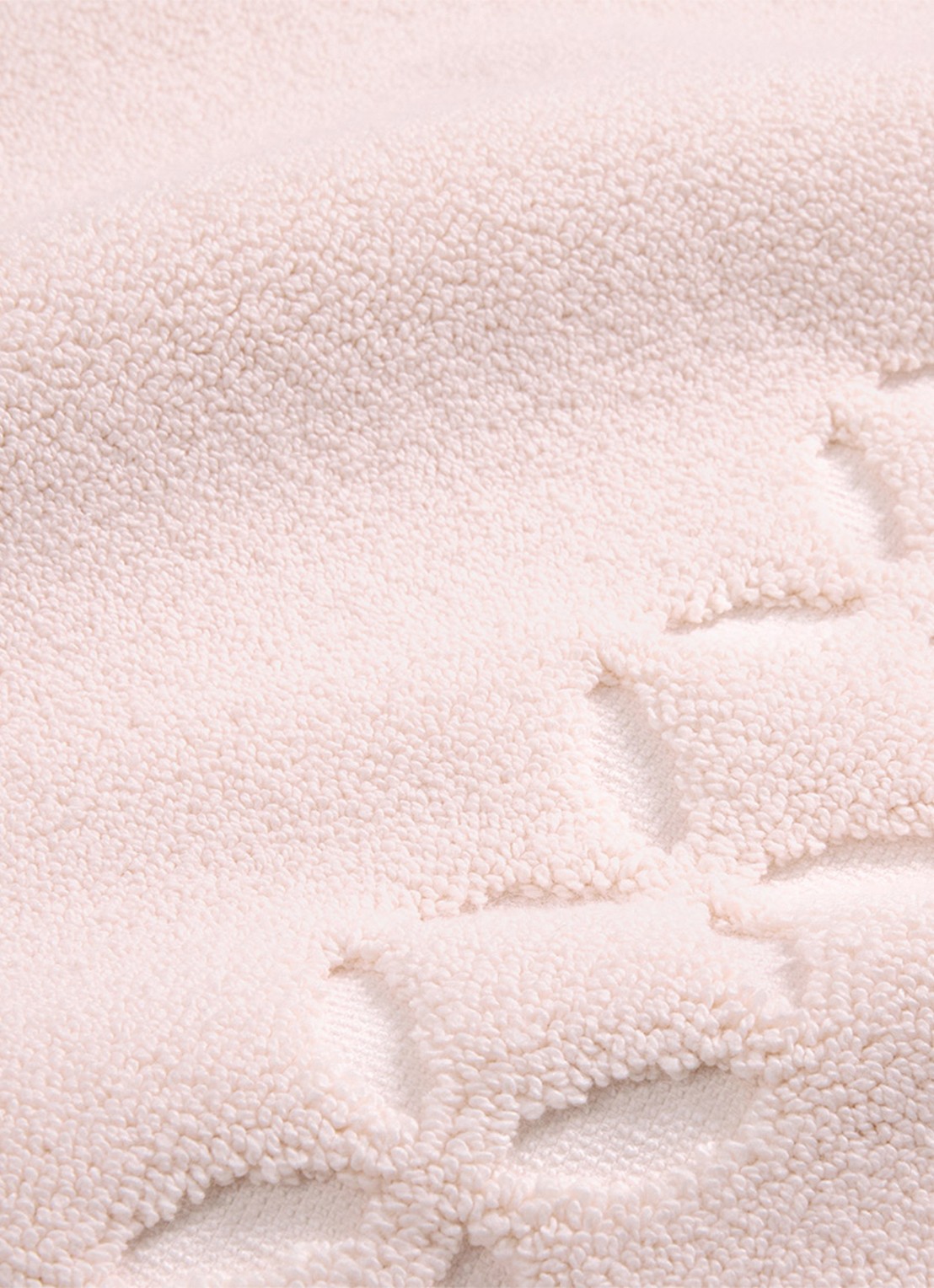 Yves Delorme Nature Amande washand - 550 gr/m2 - 33 x 33 cm - voorkant 2 lichtroze