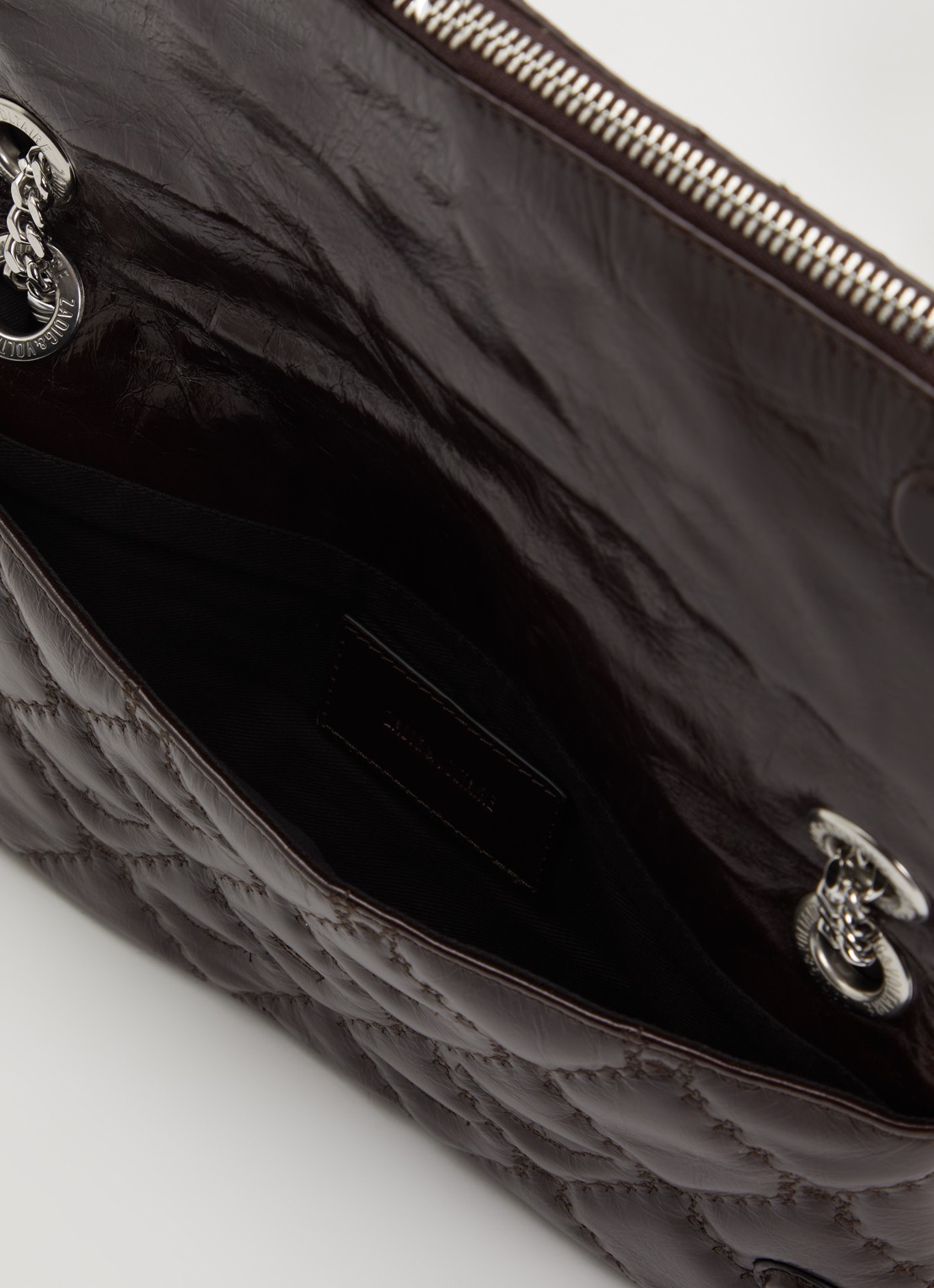 Zadig&Voltaire Rock II Vintage clutch van lakleer met verstelbare schouderriem - detail donkerbruin