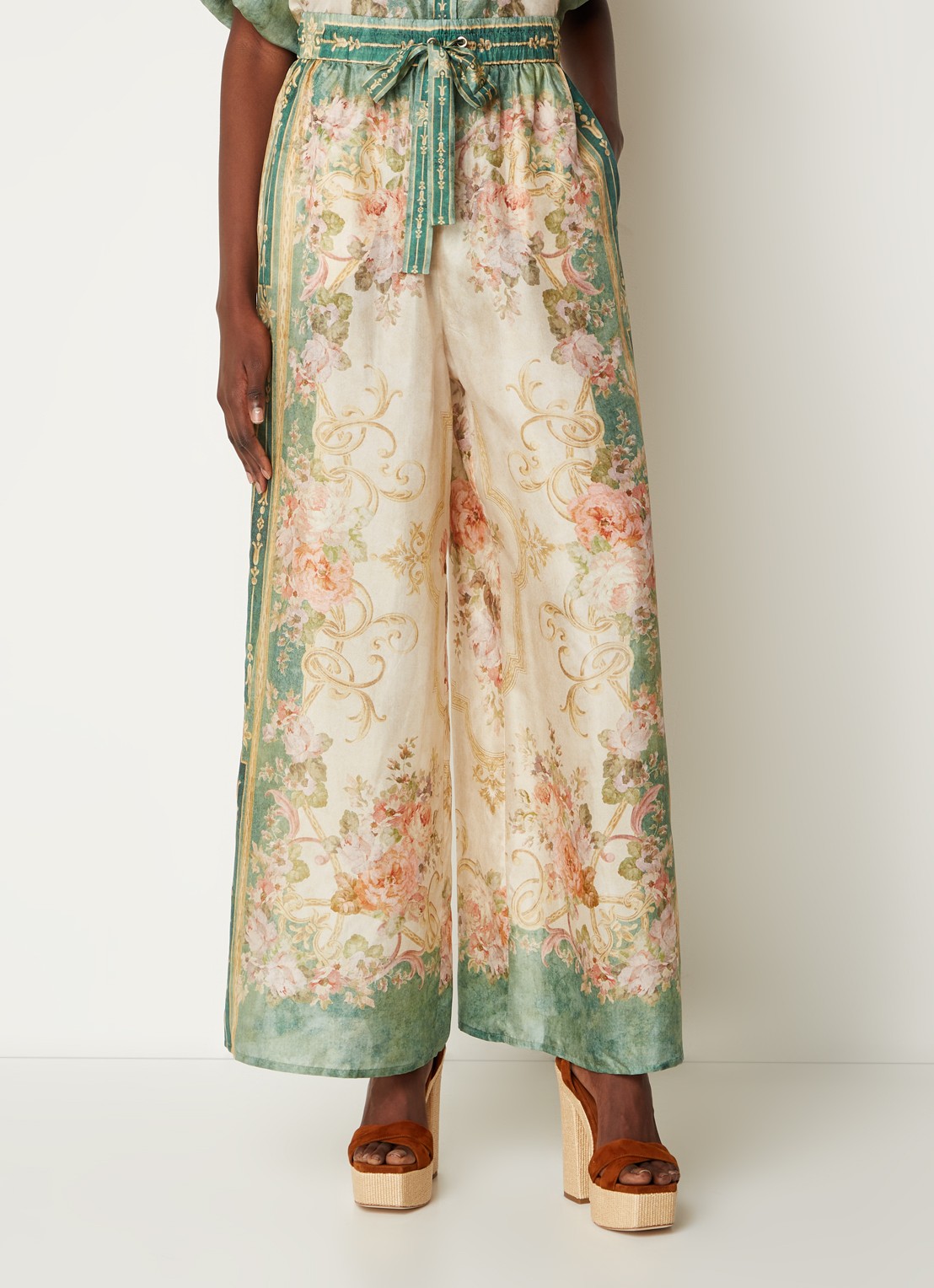 Zimmermann August high waist wide fit palazzo broek van zijde met bloemenprint - detail beige