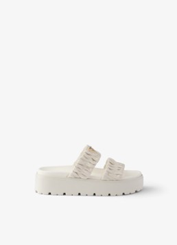 Prada Dames Matelassé slipper van lamsleer in de kleur Gebroken wit