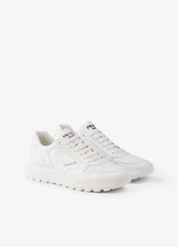 Prada Heren Prax 01 Re-Nylon sneakers met leren details en logo in de kleur Wit