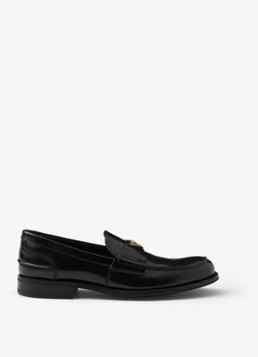 Prada Heren Loafer van kalfsleer met logo in de kleur Zwart