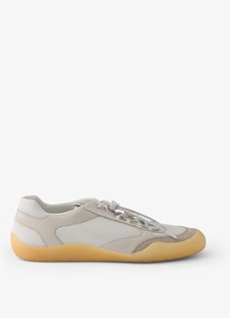 Prada Heren Speedrock sneaker van leer met mesh details in de kleur Beige