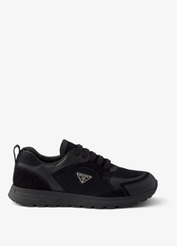 Prada Heren Prax sneaker van leer met mesh details in de kleur Zwart