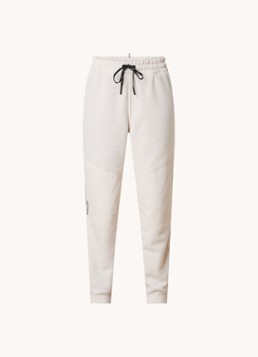 Moncler Dames High waist tapered fit broek met steekzakken in de kleur Gebroken wit, maat: S