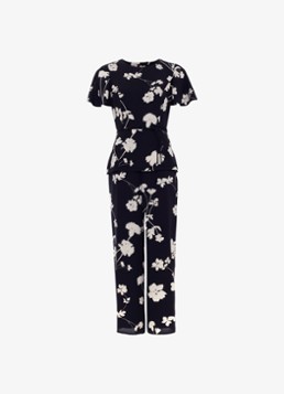 Phase Eight Dames Jolie wide fit jumpsuit met bloemenprint en strikceintuur in de kleur Zwart