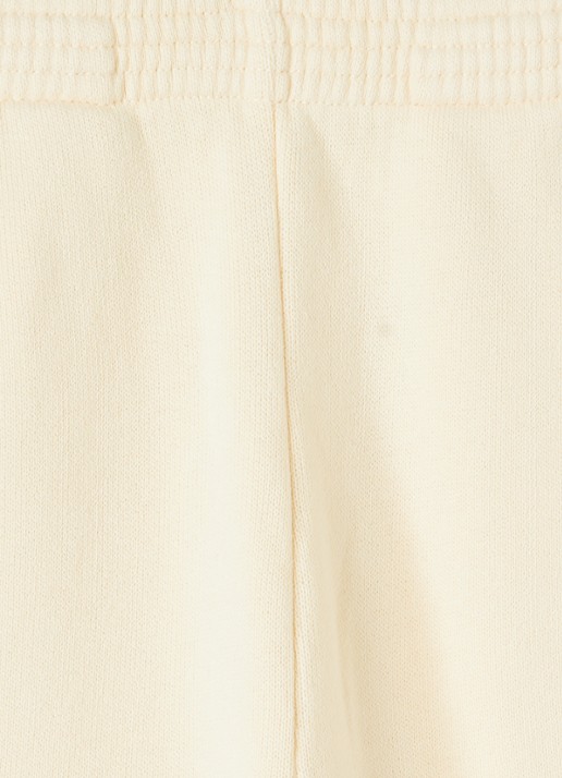 American Vintage Izubird tapered fit joggingbroek met logo - detail 3 lichtgeel