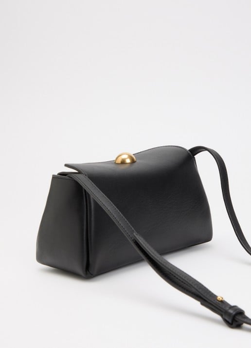 AMI Paris Mini Carrousel clutch van leer met afneembare schouderriem - achterkant zwart