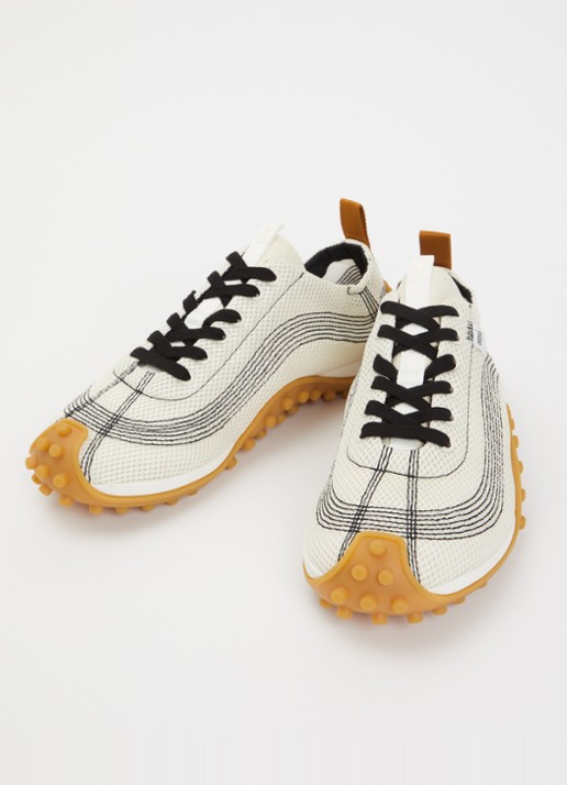 AMI Paris Mirage sneaker met schapenleren details - detail ivoor