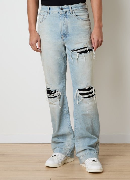 AMIRI MX1 loose fit jeans met destroyed afwerking