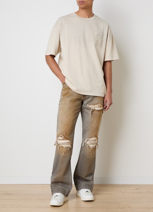 AMIRI MX1 straight leg jeans met destroyed afwerking - voorkant 2 beige