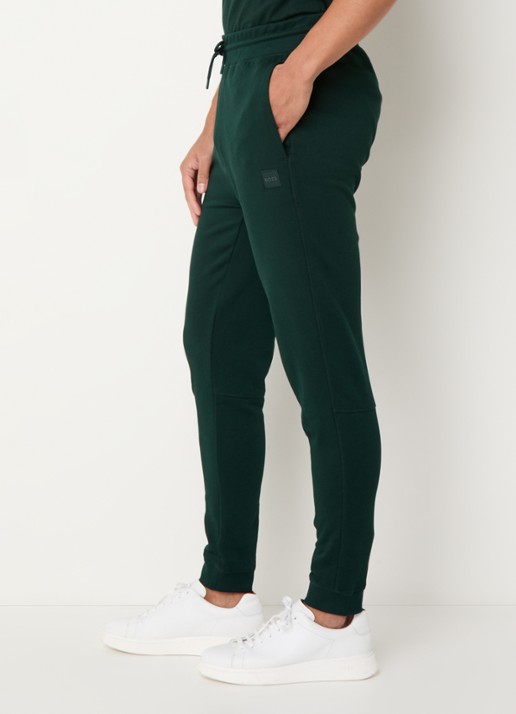 BOSS Tapered fit joggingbroek met logo en steekzakken - detail 5 bronsgroen