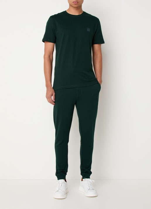 BOSS Tapered fit joggingbroek met logo en steekzakken - voorkant 3 bronsgroen