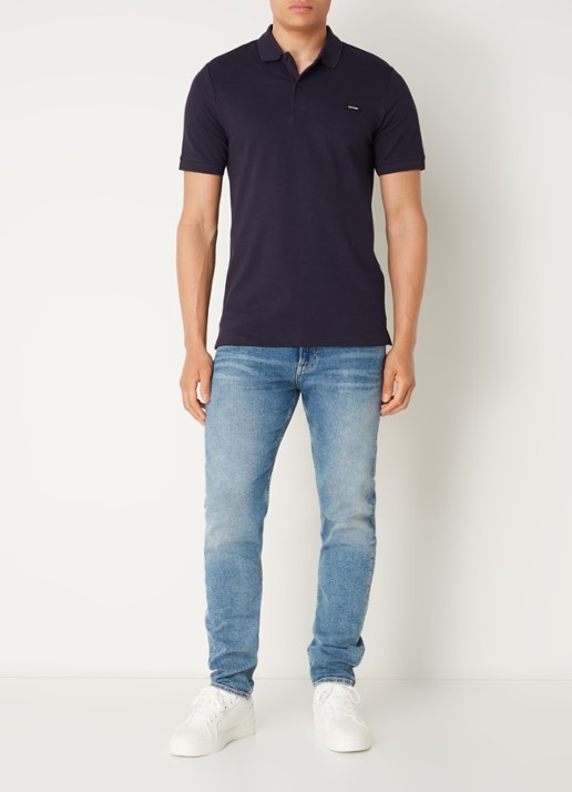 Calvin Klein Slim fit polo van piqué katoen met logo - voorkant 3 donkerblauw
