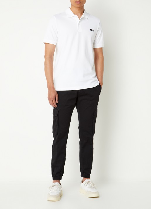 Calvin Klein Slim fit polo van piqué katoen met logo - voorkant 3 wit