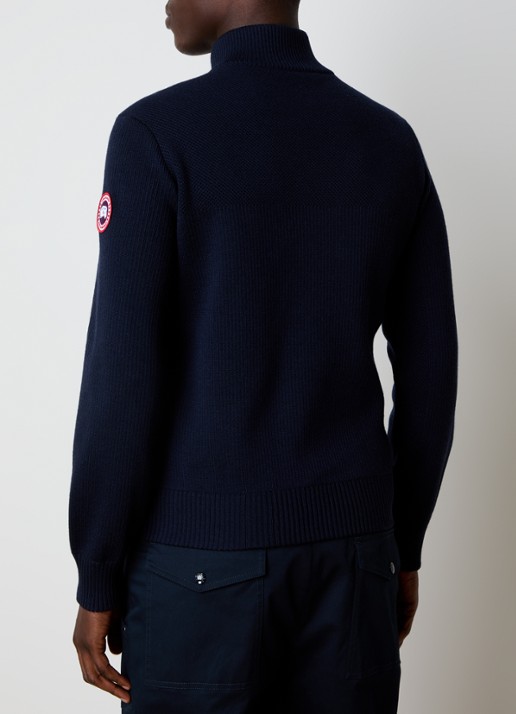Canada Goose Hybridge ribgebreid vest van wol met gewatteerd voorpand - achterkant donkerblauw